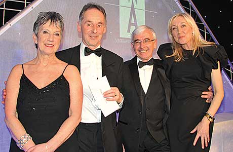 It was a busy night for Bill Mair, sales director of CJ Lang, above, second left, as he joined Scottish Wholesale Association executive director Kate Salmon,above left and presenter Cathy Macdonald, above right, on stage on three occasions to receive SWA Achievers awards. In the picture above they are joined by Peter Baird, field sales development manager, Kraft Foods UK for the presentation of the Champion of Champions Award.