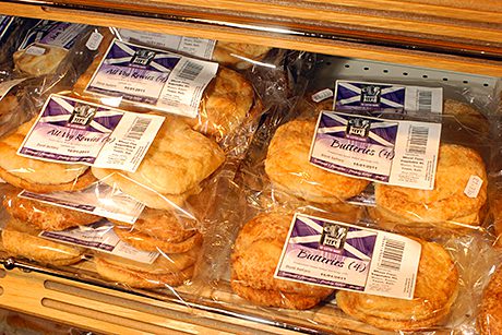 Mitchells of Inverurie shoppers like to see local bakery specialities like butteries on shelf, left. The store also has its own-brand range of biscuits and cakes. The Walkers and Border Biscuits display at Brownlie’s in Biggar, right. The gifting and sharing packs are popular with shoppers all year round, according to owner-manager Bruce Morgan. 