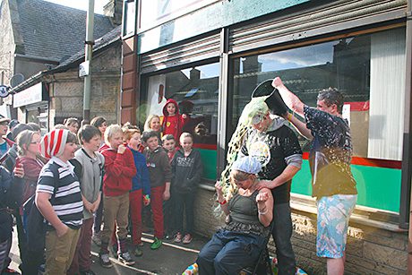 managing director Joanna Giacopazzi is well and truly cream pied as staff at the Milnathort store raise cash for Red Nose Day. 