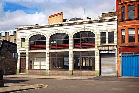 The Botanic Gardens Garage, off Byres Road in Glasgow. There’s speculation that Whole Foods Market may move in to join Waitrose and Marks & Spencer in competing with the area’s traditional specialist food shops and delis.