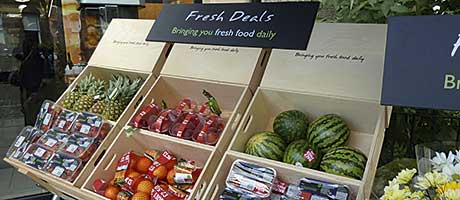 Fresh produce, inside-out. The Warrender Park Scotmid uses window  displays, fresh produce fixtures positioned to be visible from outside the store, and mobile outdoor display equipment to take its fresh produce message to the Edinburgh street.