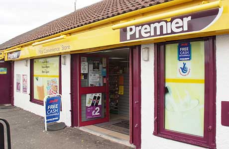 Mo’s Convenience store in Coatshill in the Lanarkshire town of Blantyre. The store has developed a series of sustainability and environmental initiatives. Top right, the red bin that once housed rubbish for uplift is planned to become a glass recycling facility, centre right the store’s innovative re-use carrier bag bin and battery recycling box, and, lower right, the low energy LED lighting currently on trial in the store.