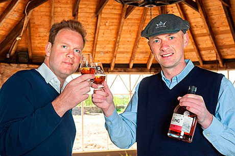 William Wemyss of Wemyss Malts and Douglas Clement, founder director, Kingsbarns Distillery toast the start of the build at Kingsbarns Distillery, in Fife.