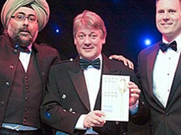 Ale world leaders – Craft beer focus Norman Sinclair, centre, MD of Sinclair Breweries, picks up Orkney Dark Island Reserve’s Scotland Food and Drink Excellence Award.
