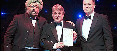 Ale world leaders – Craft beer focus Norman Sinclair, centre, MD of Sinclair Breweries, picks up Orkney Dark Island Reserve’s Scotland Food and Drink Excellence Award.