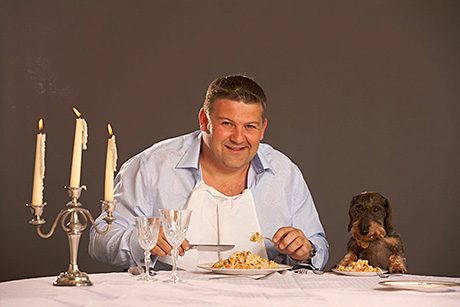 MPM’s Julian Bambridge and his dog Ollie do dinner together. Ollie’s Encore dog food is available in wet and dry varieties. Pedigree’s PMPs appeal to more traditional wet food purchasers, who appreciate the reassurance of a price on the pack.