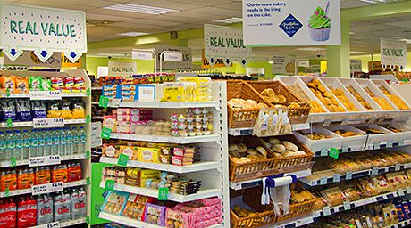 Pictured above, Scotmid’s new value-led store at Prestonpans provides more economy offers as well as an increased range of local products. And, pictured right, the new Stuart’s in-store butcher counter at the South Queensferry Scotmid.