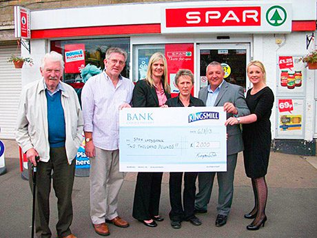 The winners! Left to right: Bill Watters and David Croll of the Ladybank Development Trust; Jill McEwan, area manager, Spar; Chrissie McLaren, Spar Ladybank; and Robert Wilson and Dionne Wilson, Kingsmill.