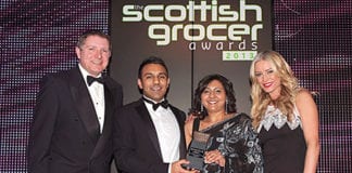 Shaun’s Premier Store, Cardonald in Glasgow receives the Best Soft Drinks Outlet of the Year Award at the Scottish Grocer Awards 2013 dinner earlier this year.