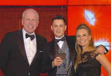 Andrew Helm, key account manager for British American Tobacco, left, and sports TV personality Georgie Thompson, right, present the Scottish Grocer 2014 Employee of the Year Award to Marc McCabe.