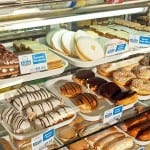 Symbol of partnership Serve-over, till-point display cabinets featuring goods from local bakery specialists are now frequently seen in Scottish Spar shops. The symbol group is expanding its programme of partnerships with local bakers, butchers and produce providers.