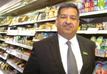 Abdul Majid, President of the Scottish Grocers’ Federation, hopes to have a cross-party working group in the Scottish Parliament focused on convenience stores by the end of 2015. He is pictured in his Nisa store in Bellshill.