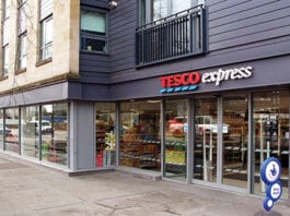Tesco posts record loss