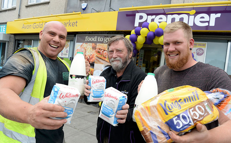 Men holding staple goods from Premier