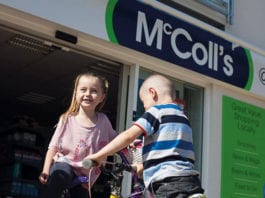 Morrisons snaps up McColl’s Two children play infront of a McColls store front