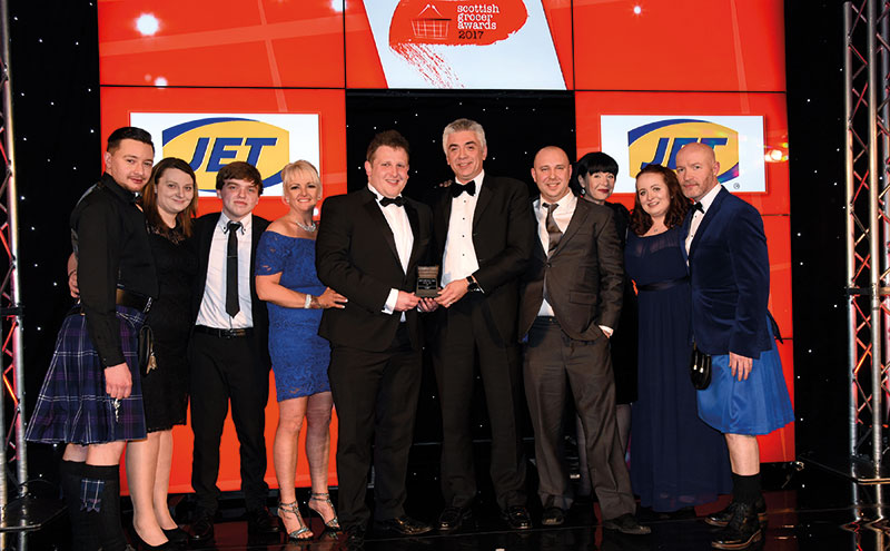 Graham Clout, retail sales manager, JET, presents the Innovation Award to Dan Brown and the team from Giacopazzi’s, Sands House, Kinross. The store also scooped the Bakery Retailer of the Year award on the night.