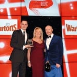 Rising to the occasion Angie Turnbull, Warburtons retail development area manager, centre, and host Craig Hill, right, present the Scottish Grocer Bakery Retailer of the Year Award (managed store) to Craig McAulay of Scotmid Stockbridge.