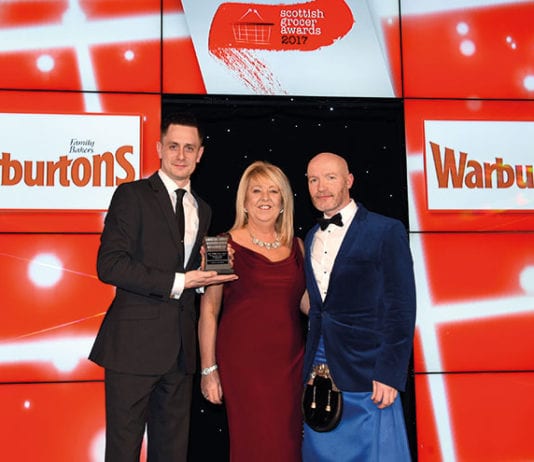 Rising to the occasion Angie Turnbull, Warburtons retail development area manager, centre, and host Craig Hill, right, present the Scottish Grocer Bakery Retailer of the Year Award (managed store) to Craig McAulay of Scotmid Stockbridge.