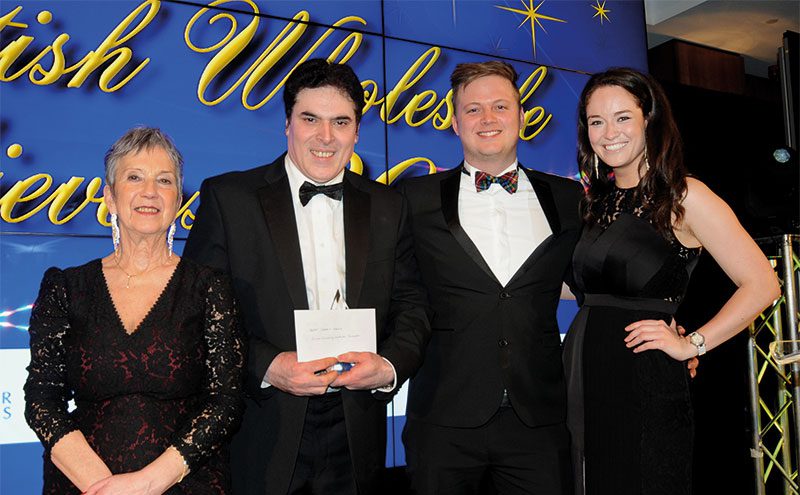James Dunbar, field sales development manager at Mondelez International, presents Best Cash & Carry to Ali Afsar, trading director, United Wholesale (Scotland), with Kate Salmon, executive director, Scottish Wholesale Association and host Jennifer Reoch of STV. The award went to United’s depot in Queenslie.