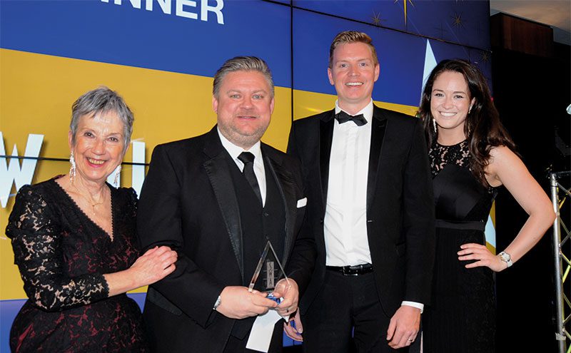 Lawrence Williamson, senior national account manager at Halewood International, presents Best Delivered Operation (Retail) to Simon Hannah, MD of JW Filshill with Kate Salmon, left, executive director, SWA and host Jennifer Reoch of STV, right.