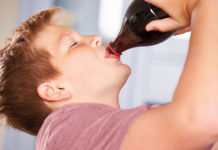 child drinking soft drink