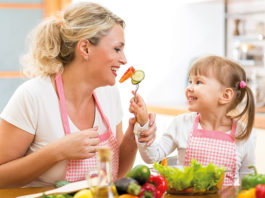 On a health kick Family eating vegetables