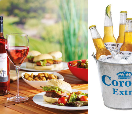 Catering for a garden party The Straw Hat wine and Corona in a bucket