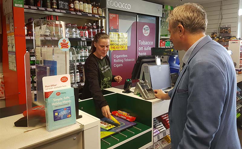 Woman at a till