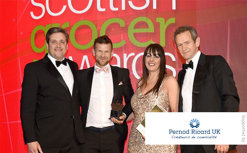 James Middleton, field sales director at Pernod Ricard UK and Alexander Armstrong present the Licensed Retailer of the Year award to Ross Macpherson and Mandi Duncan, Doonfoot Day-Today, Ayr.
