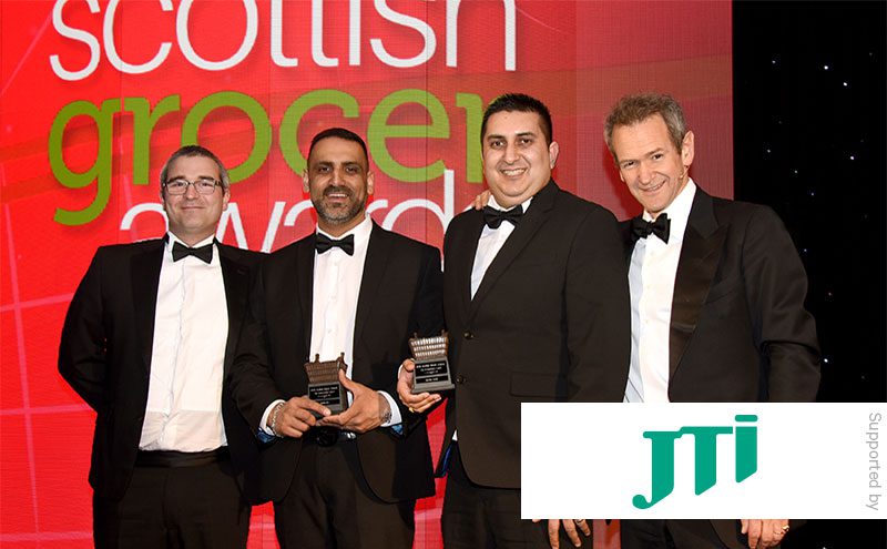 Stephen Donaghy, area sales manager JTI, and Alexander Armstrong present The Entrepreneur Award to Sayiad Hamid (second from left) and Imran Ali, Bourtreehill Supermarket.