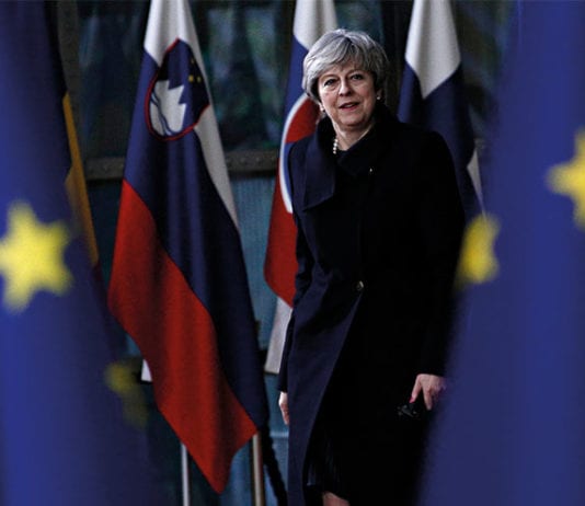 Brexit means challenges Theresa May and EU flags