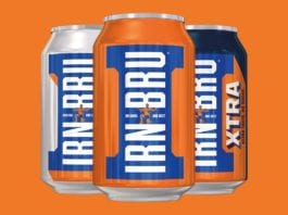Essential in the chiller Irn Bru cans on orange backgroun