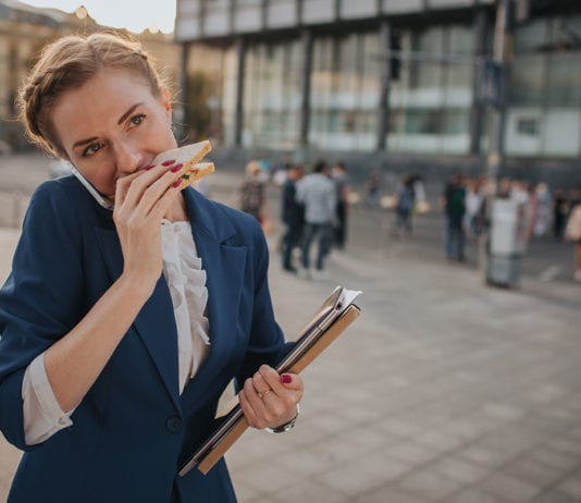 Diversity is on the lunch menu busy-woman-eating-sandwich