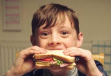 Child eating sandwich