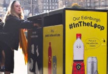 girl putting rubbish in bin