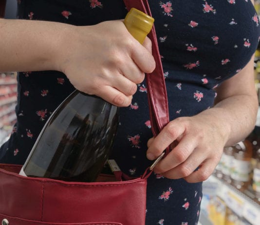 Scottish shoplifting on the up woman shoplifting wine