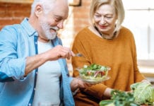 older generation enjoying salad