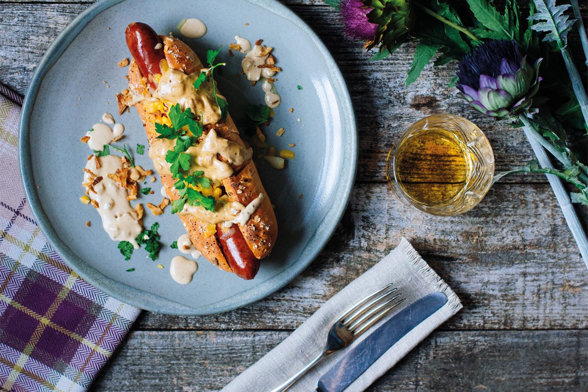 A haggis hot dog with whisky sauce