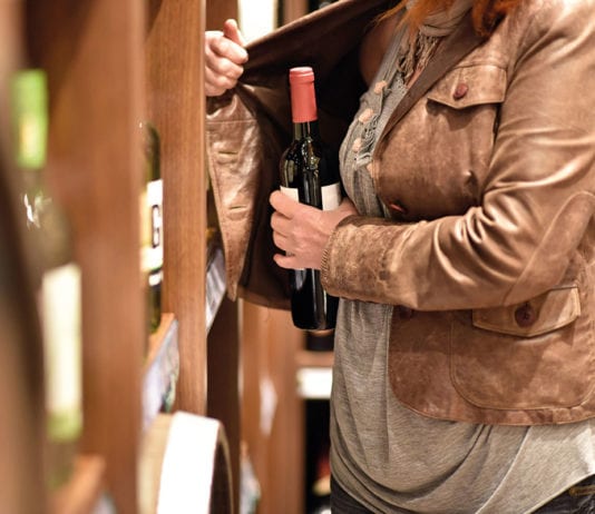 Have your say on crime Person stealing a bottle of wine