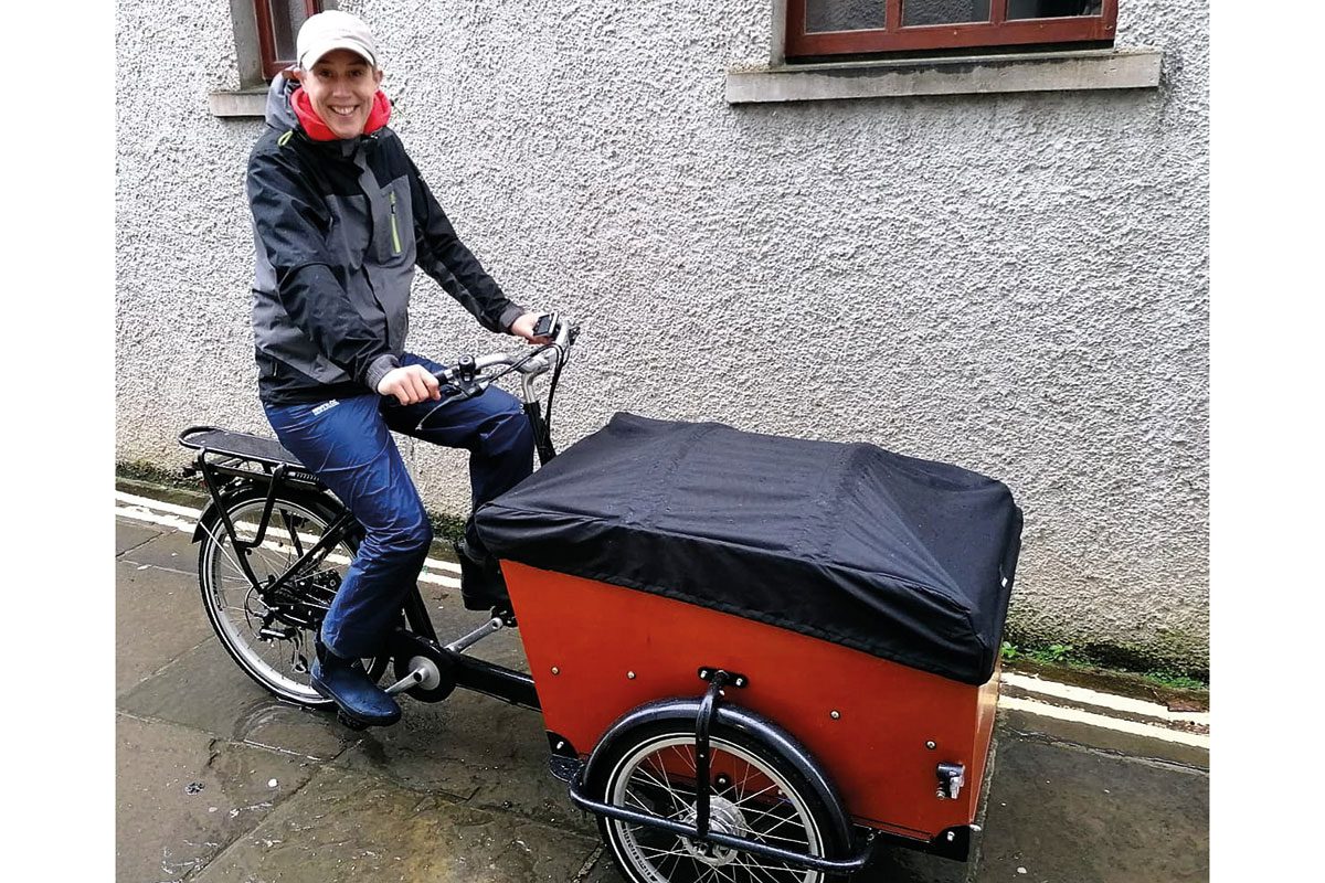 Business-owner,-Karin-Jonsson-delivering-products-on-her-Babboe-Cargobike