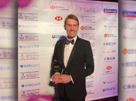 Victory for Shepherd man holding award