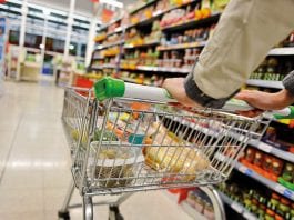 Early March lockdown causes huge sales uplift trolley in supermarket