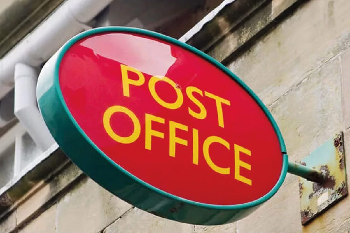 image shows a red post office sign