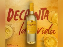 Continental drinking Campo Viejo bottle