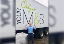 John Galls in front of an M&S lorry