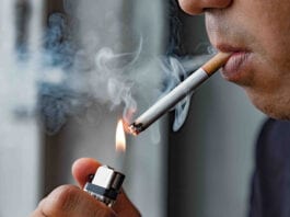 Calls for more regs Man smoking cigarette