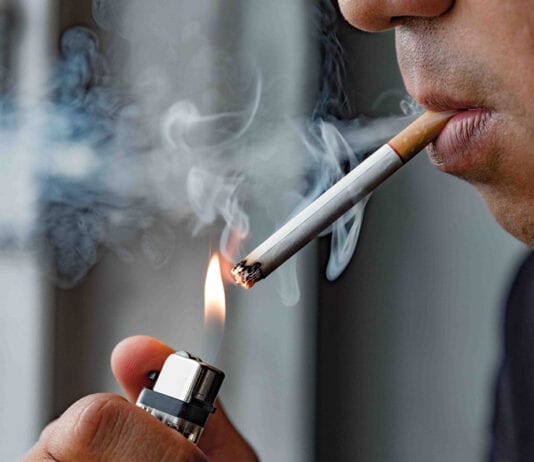 Calls for more regs Man smoking cigarette