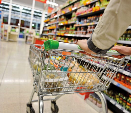 Tariffs could be disastrous man pushing trolly