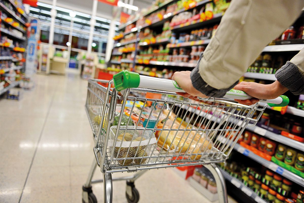 man pushing trolly