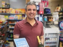 Cash prizes for retailers Ali Irtiza with prize winnings